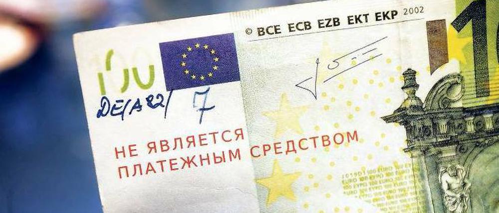 Nomen est omen. „Nicht als Zahlungsmittel einsetzbar“ steht in kyrillischen Buchstaben sinngemäß auf dieser Blüte, die die Bundesbank eingezogen hat. Foto: dpa