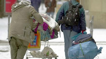 Obdachlose in Frankfurt am Main. Die reichsten Deutschen leben im Taunus.