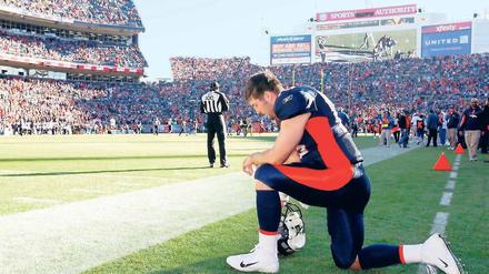 Tebowing im Original. Die Gebetspose von Tim Tebow hat in den USA einen eigenen Namen und eine eigene Internetseite. Foto: Reuters