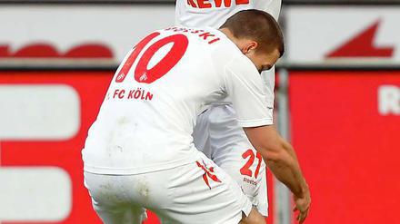 Doppelpack: Lukas Podolski (vorne) und Christian Clemens trafen je zweimal gegen Freiburg.