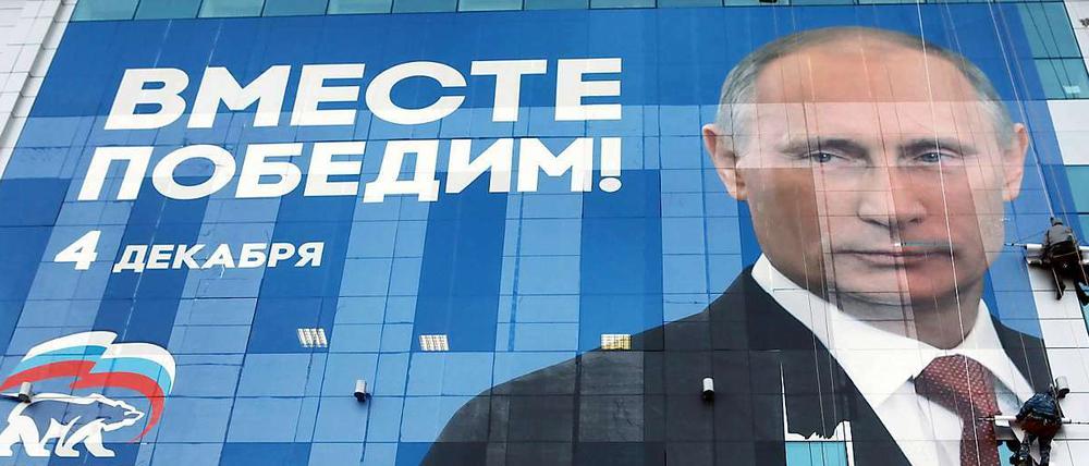 So sieht er sich gerne: Putin auf einem aktuellen Wahlwerbeposter.