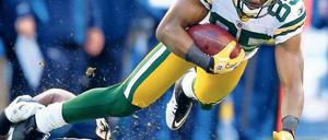 Her damit! Zu solchen Szenen könnte es auch zwischen den Fans der Packers (hier Passempfänger Greg Jennings) bei dem Verkauf der begehrten Aktien kommen. Foto: Reuters