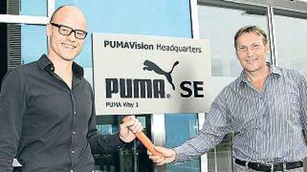 Abschied. Jochen Zeitz (rechts) übergibt den Stab an Franz Koch. Foto: dpa