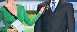 Suchbild. Welche der beiden Personen ist der frühere Fußballstar Ronaldo? Foto: AFP