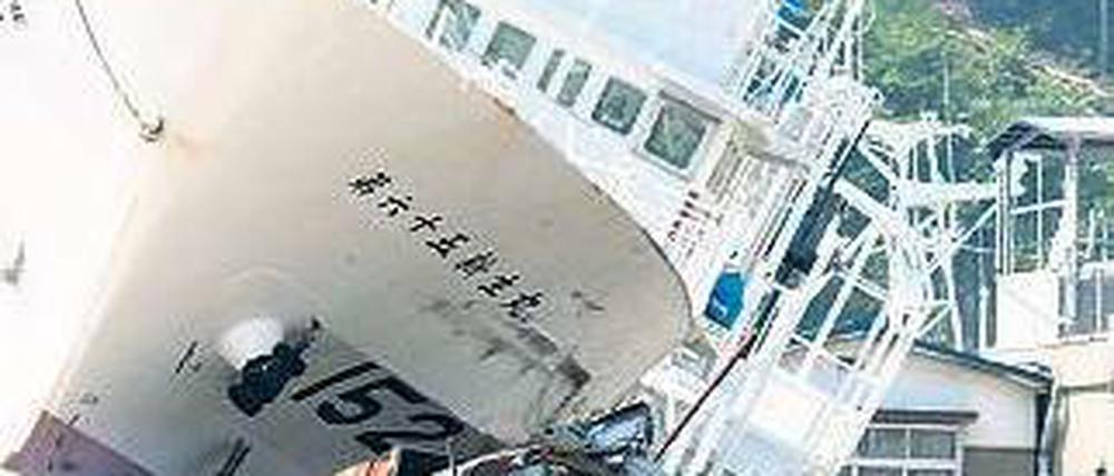 Land unter. Das Beben in Japan hat laut Munich Re einen gesamtwirtschaftlichen Schaden von 210 Milliarden Dollar – deutlich mehr als der Hurrikan Katrina im Jahr 2005. Foto: dpa
