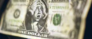 Schock. Einigen sich Demokraten und Republikaner nicht rechtzeitig auf eine Anhebung der Kreditgrenze, steigen die US-Schulden am 2. August über 14,294 Billionen Dollar. Foto: pa/dpa