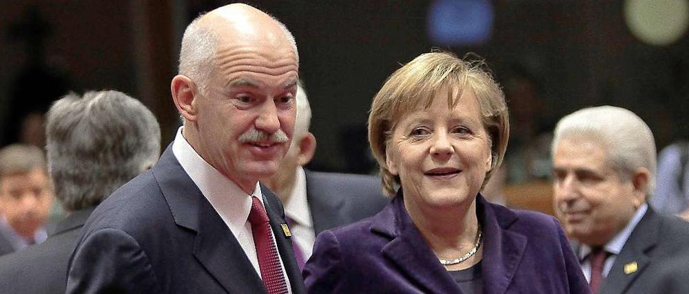 Griechenlands Regierungschef Papandreou muss sich von seinen Amtskollegen - zum Beispiel von Kanzlerin Merkel - einiges gefallen lassen.
