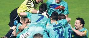 Im Dauerjubel. Unter Trainer Guardiola gewinnt der FC Barcelona Titel um Titel, nun kam die 21. Meisterschaft dazu. Foto: dpa