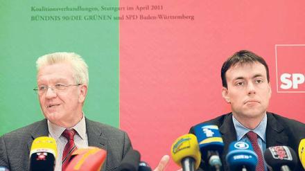 Ernüchterung: Die Begeisterung für die gemeinsame Koalition ist beim grün-roten Spitzenduo, Winfried Kretschmann (l.) und Nils Schmid, offenbar schnell abgeflaut. Auch sie streiten sich jetzt über den Neubau des Stuttgarter Hauptbahnhofs.
