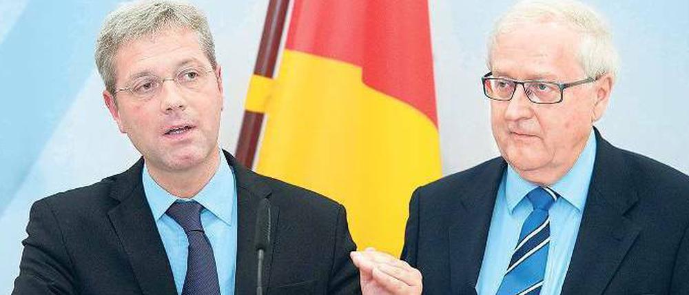 Bundesumweltminister Norbert Röttgen (l.) und Bundeswirtschaftsminister Rainer Brüderle. 