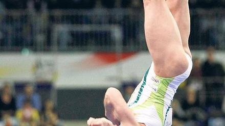 Den Dreh raus. Oksana Tschussowitina sicherte sich gute Noten – auch im für sie oft schwierigen ersten Sprung. Foto: Reuters