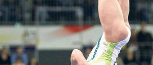 Den Dreh raus. Oksana Tschussowitina sicherte sich gute Noten – auch im für sie oft schwierigen ersten Sprung. Foto: Reuters