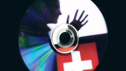 Bankdaten. CDs mit Informationen über deutsches Geld in Liechtenstein und der Schweiz alarmieren den Fiskus. Foto: dpa