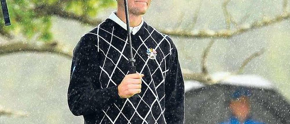 Loch Nass. Martin Kaymer hat sich das Prädikat Allwetterspieler gesichert. Er verhinderte an der Seite von Lee Westwood einen höheren Rückstand der Europäer. Foto: dpa