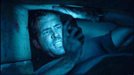 Bei Anruf Leben. Ryan Reynolds spielt in "Buried" einen im Irak lebendig begrabenen Amerikaner. Seine einzige Verbindung zur Außenwelt ist ein Handy.