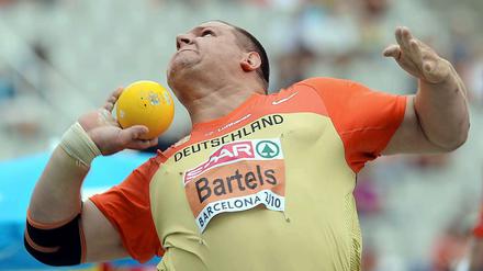 Kraftakt. Ralf Bartels stößt die Kugel auf 20,93 Meter. Das reicht für die Bronzemedaille.
