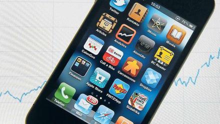 Mit Spielen drin: Das iPhone 4. Foto: ddp