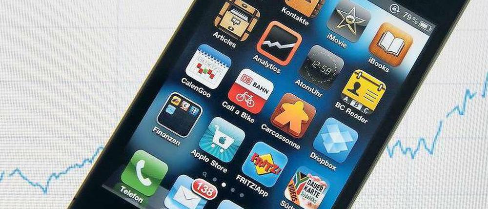 Mit Spielen drin: Das iPhone 4. Foto: ddp