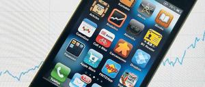 Mit Spielen drin: Das iPhone 4. Foto: ddp