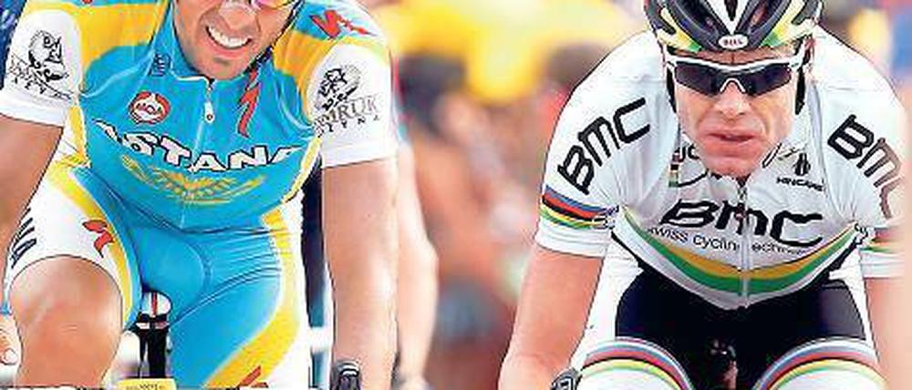 An der Seite der Stars. So sieht sich Cadel Evans (rechts neben dem zweimaligen Tour-Sieger Alberto Contador). Dass er nicht als Spitzenfahrer und Favorit auf den Gesamtsieg wahrgenommen wird, ärgert den Australier gewaltig. Foto: dpa