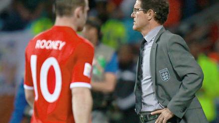 Bei der Auswechslung im Slowenien-Spiel würdigten sich Rooney und Trainer Capello keines Blickes.