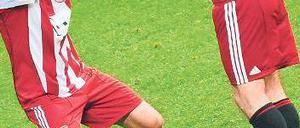 Party der Schlüsselspieler. Die bewegungsfreudigen Angreifer Thomas Müller (l.) und Ivica Olic sind wichtige Figuren im System von Trainer Louis van Gaal. 