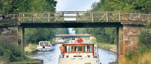Dahingleiten auf dem Rhein–Marne-Kanal in Elsass-Lothringen. Foto: dpa-tmn