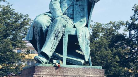 Versonnen. R. Schumann Foto: akg-images