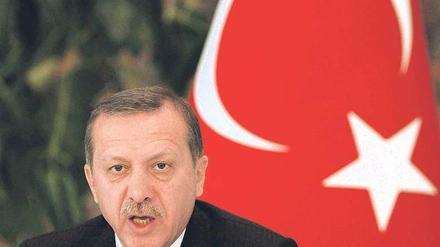 Warme Worte. Recep Tayyip Erdogan verlangt Verbundenheit mit dem Heimatland. Aber er fordert seine Landsleute im Ausland auch dazu auf, sich zu integrieren. Foto: Reuters