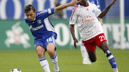 Schalkes Rafinha und Jonathan Pitroipa