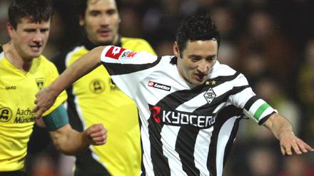 Oliver Neuville (rechts) rettete den Punkt