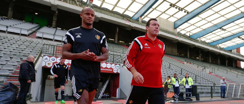 Belgiens Trainer Marc Wilmots (r.) mit Vincent Kompany.