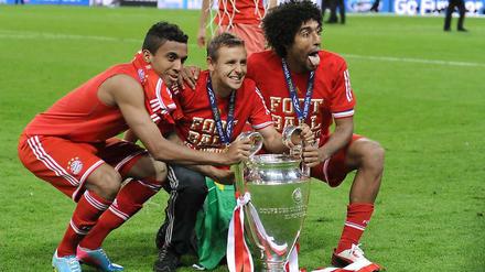 Der letzte Pokal in dieser Saison? Luiz Gustavo(links) und Dante (rechts) könnten das DFB-Pokalfinale in Berlin gegen den VfB Stuttgart verpassen, wenn der brasilianische Verband weiter auf ihr rechtzeitiges Erscheinen drängt.