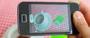 Tasse Kaffee, virtuell bezahlt. In einigen Bars und Läden im Graefekiez kann man mit Bitcoins zahlen.