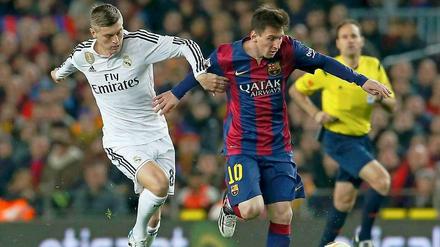 Toni Kroos und Lionel Messi.