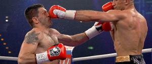 Arthur Abraham landet einen Treffer im Gesicht seines Gegners. 
