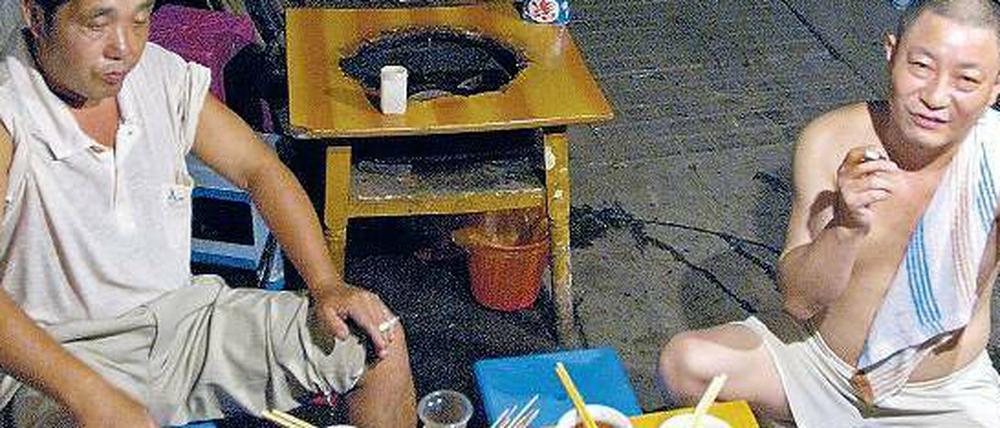 Manche mögen’s scharf. Gäste eines Hot-Pot-Restaurants in der zentralchinesischen Stadt Chongqing.