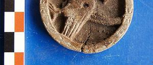 Der Spielstein, der in der Breite Straße entdeckt wurde - kannten die Urberliner Backgammon?