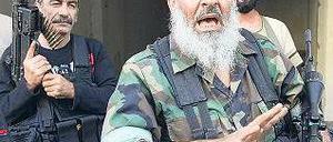 Parteigänger des Diktators: Sunnitische Salafisten haben sich in den vergangenen Tagen heftige Gefechte mit libanesischen Gegnern Assads geliefert. Foto: AFP