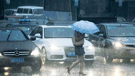 Stern im Regen. Neben einheimischen Marken kämpfen Autokonzerne aus Europa und den USA in China um Marktanteile. Foto: AFP