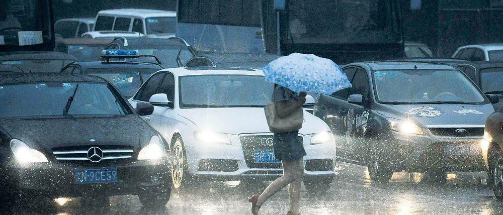 Stern im Regen. Neben einheimischen Marken kämpfen Autokonzerne aus Europa und den USA in China um Marktanteile. Foto: AFP