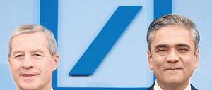 Gut lachen haben die Vorstandschefs Fitschen (li.) und Jain. Der Gewinn legte zu. Foto: dpa