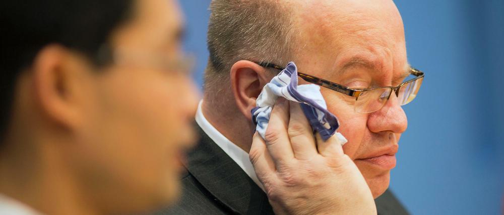 Keine Zeit für kühle Köpfe: Umweltminister Peter Altmaier (CDU) und Wirtschaftsminister Philipp Rösler (FDP, im Vordergrund)