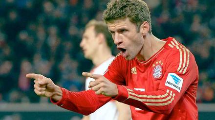 So sehen Sieger aus! Torschütze Thomas Müller.