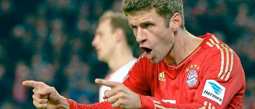 So sehen Sieger aus! Torschütze Thomas Müller.