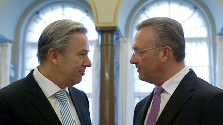 Schlechte Umfragewerte für Berlins Regierenden Bürgermeister Klaus Wowereit (SPD) und Innensenator Frank Henkel (CDU)