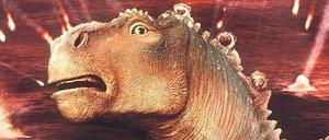 Feurige Aussichten. Betroffen registriert das Iguanodon in dem Disney-Film „Dinosaurier“ Meteoriteneinschläge.