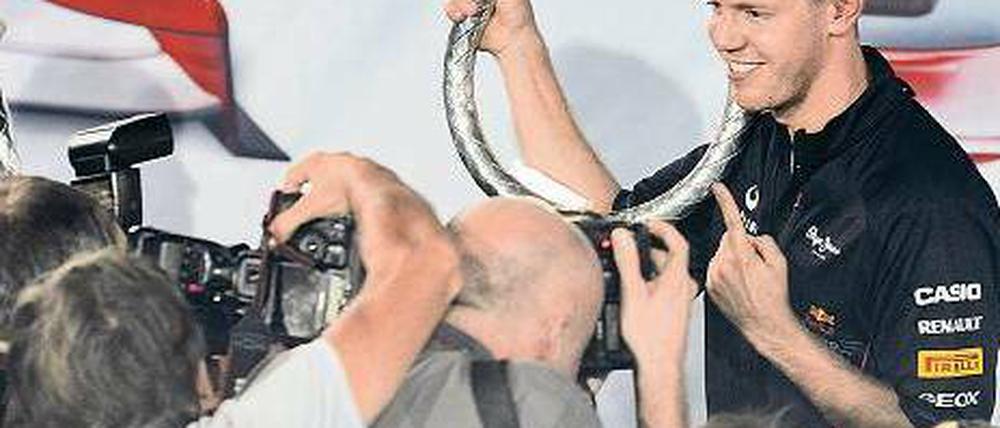 Der Weltmeister dreht wieder am großen Rad. Sebastian Vettel gibt auf der Zielgeraden der Saison noch einmal Gas. Foto: AFP