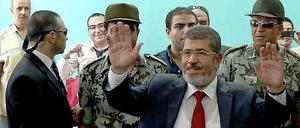 Mohammed Mursi, Kandidat der Muslimbrüder, hier bei seiner Stimmabgabe in der Stichwahl um das ägyptische Präsidentenamt.