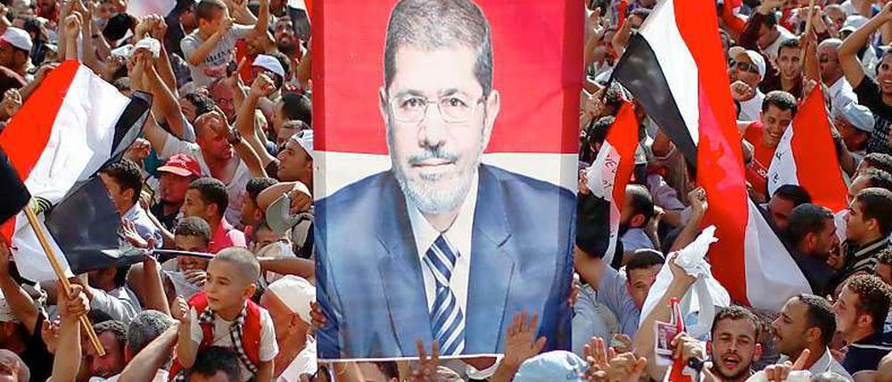 Anhänger der Muslimbrüder feiern auf dem Tahrir-Platz in Kairo den Wahlsieg von Mohammed Mursi.